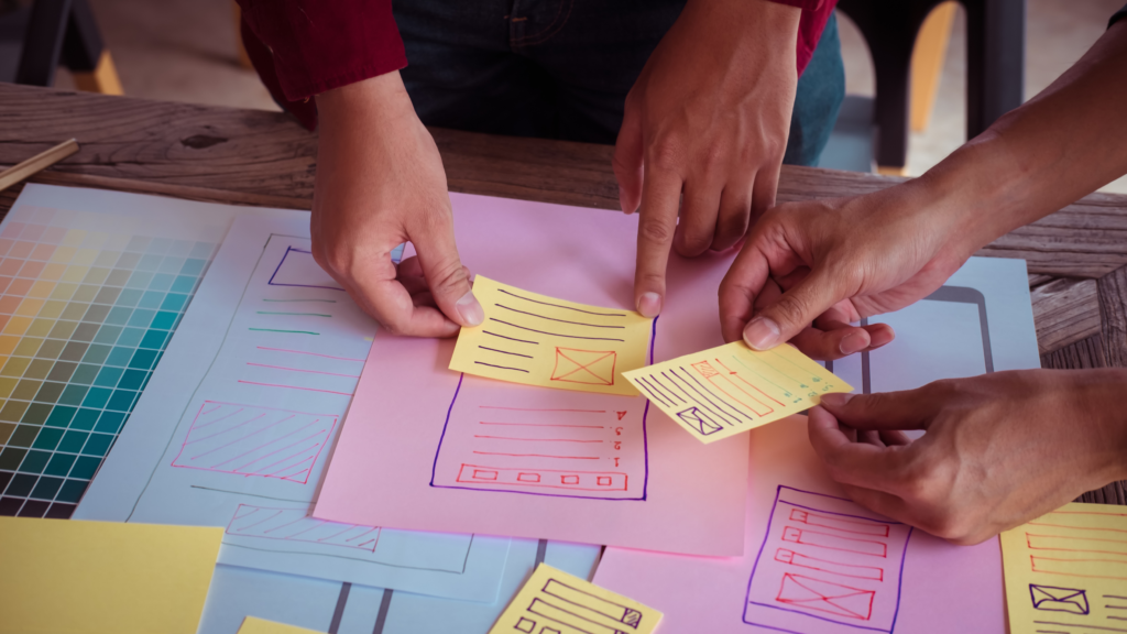 Post-it notes used for planning and organization on a desk.