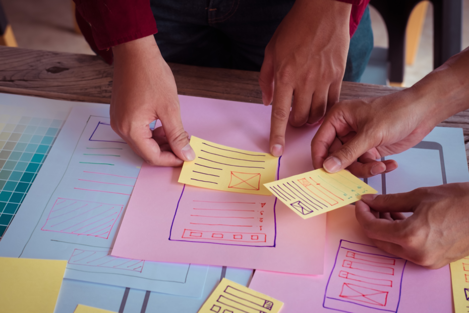 Post-it notes used for planning and organization on a desk.